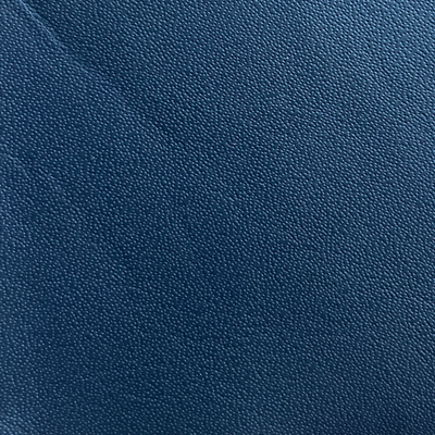 a close up of a blue leather texture