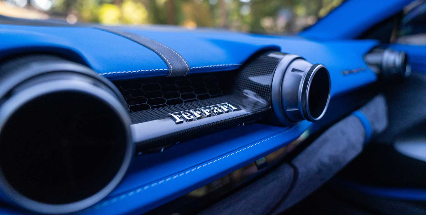 Blue Leather and Alcantara wrapped dashboard on a Ferrari