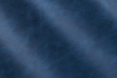 a close up of a blue leather texture