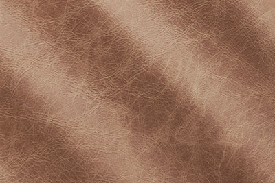 a close up of a brown leather texture