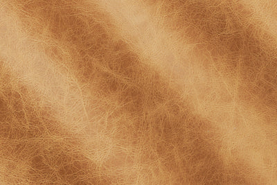 a close up of a brown leather texture