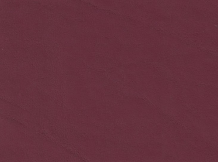 The image is a close-up of a solid, deep red color, possibly a fabric or paper.