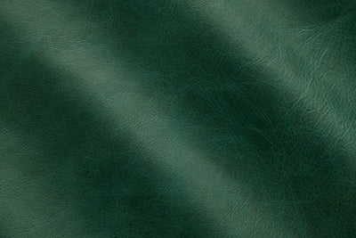 a dark green leather texture with a diagonal pattern