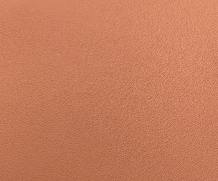 a close up of an orange leather texture