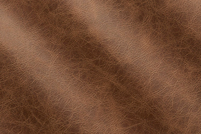 a close up of a brown leather texture