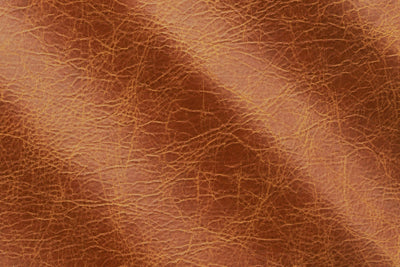 a close up of a brown leather texture