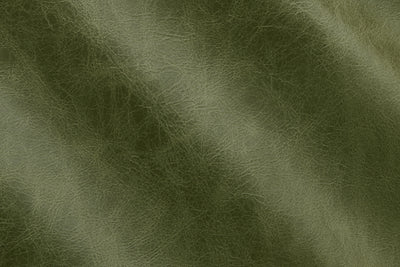 a close up of a green leather texture