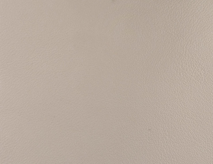 a close up of a white leather texture