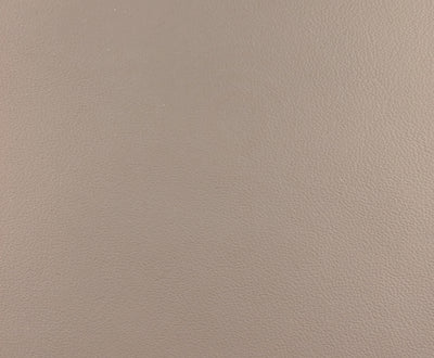 a close up view of a tan leather surface