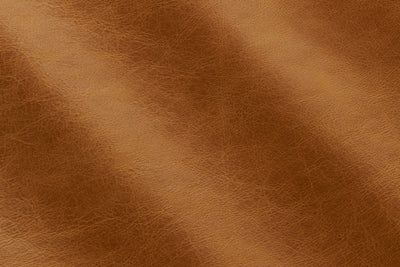 a close up of a brown leather texture