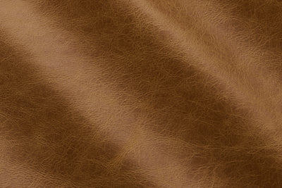 a close up of a brown leather texture