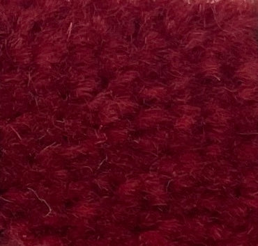 a close up of a red area rug